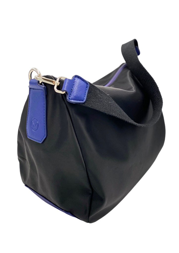 A sporty black and blue lightweight handbag made of waterproof nylon and faux leather with internal pockets and shoulder straps.