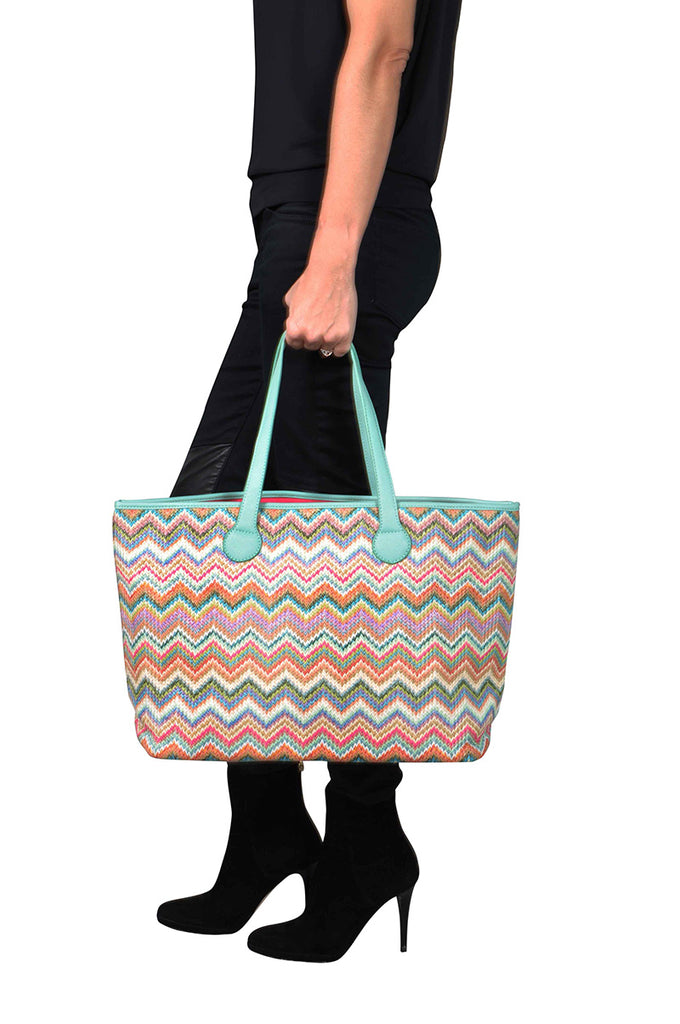 woman wearing a travel tote bag